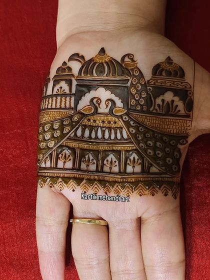 A final, clear image of the palace and peacock trial mehandi, a perfect example of the royal designs we can create.