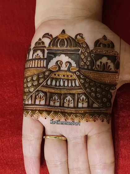 A final, clear image of the palace and peacock trial mehandi, a perfect example of the royal designs we can create.
