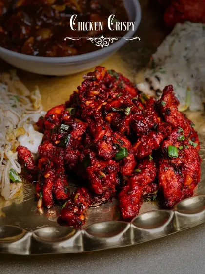 Our signature Chicken Crispy, as featured in the Thaal-E-Cheen. Shredded chicken fried until golden and tossed in a sweet and spicy sauce.