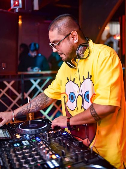 Rocking a fun Spongebob shirt at The Fixx. I like to bring my personality to my gigs, keeping things fun and unpredictable.