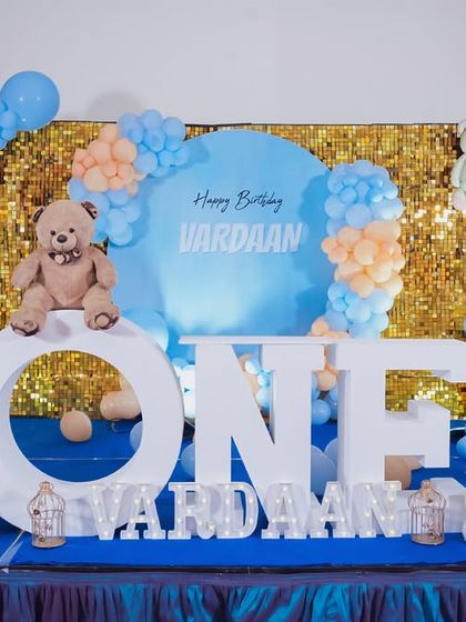 A charming 'Hot Air Balloon' themed first birthday party, with whimsical balloon decor, cloud props, and a custom backdrop, creating a dreamy and adventurous setting.