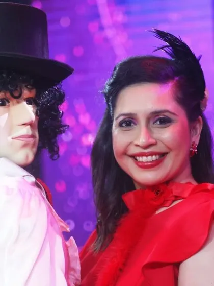 A close-up of my wife, Rujuta, with the Michael Jackson puppet. The details in the puppet's face and costume are designed to be seen from a distance by a live audience.