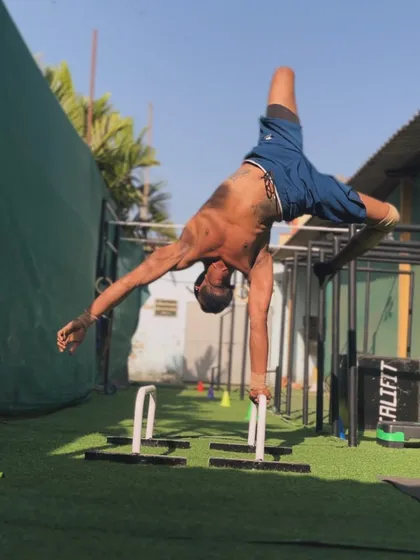 Working on the one-arm handstand, one of the ultimate displays of balance and strength in calisthenics.