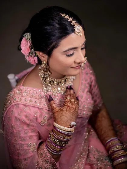 A closer look at this bride's soft pink wedding makeup. The look is simple, elegant, and lets her natural beauty shine through.