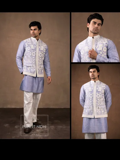 A detailed look at the lavender kurta with a Warli art jacket and matching bottoms. The intricate folk art adds a unique, cultural touch.