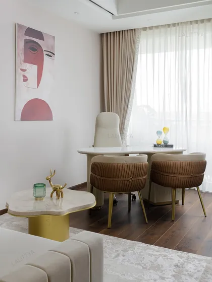 A room that moves between pause and purpose. This den was converted into a home office, featuring a custom desk, fluted visitor chairs, and warm wood flooring, creating a space to think, dream, and get things done.