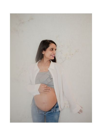 A candid solo shot of the mother-to-be. I love capturing these unposed, in-between moments that reveal genuine smiles and happiness.