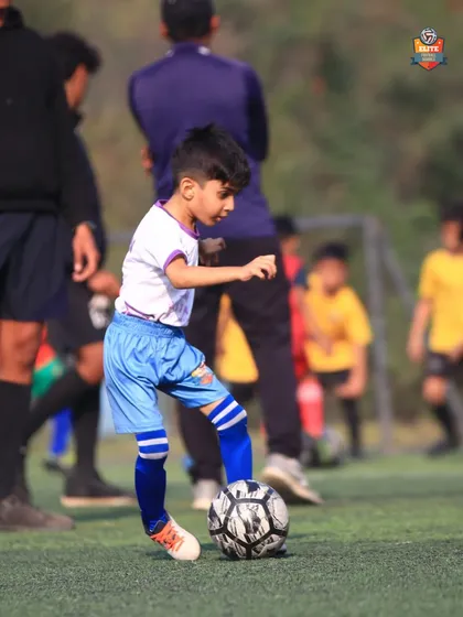 Another one of our future stars, poised and ready with the ball at his feet.