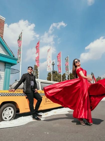 Our red satin A-line gown has a beautiful flow and movement, perfect for creating dynamic shots. It's a classic and elegant choice for a variety of photoshoot themes.