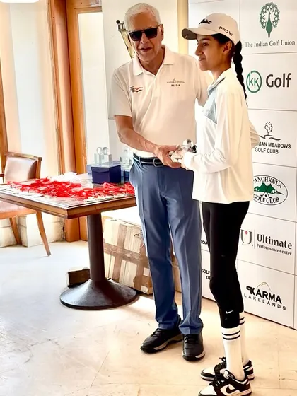 Prisca Sachdeva receives her 1st place trophy at the Golf Haryana Amateur & Junior Tournament.