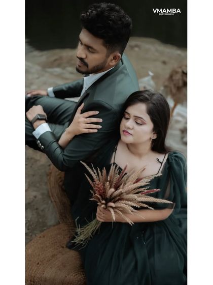 A moody and romantic portrait of a couple by the water. We use creative posing and composition to evoke emotion and tell a deeper story in our pre-wedding shoots.