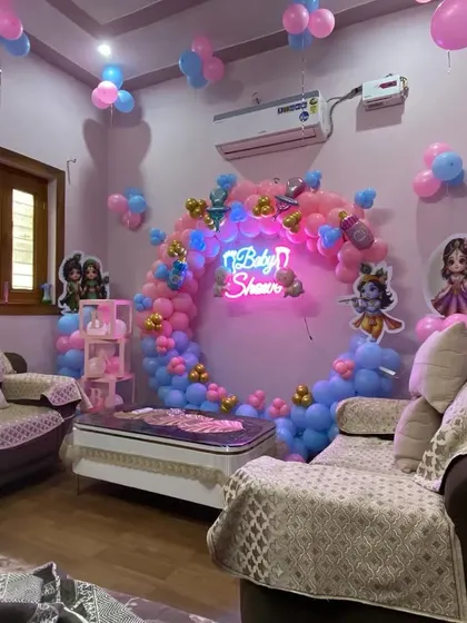 Another perspective of the Kanha ji baby shower, showing how the decorations fill the room and create a festive environment from every angle.