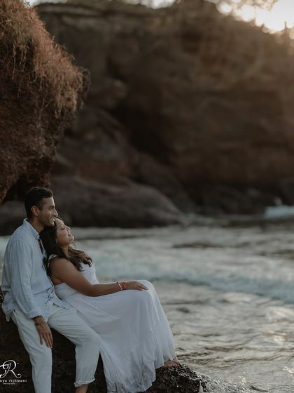 A quiet moment of reflection as the sun sets over the Goan coast. I positioned this couple on the rocks to capture a serene, cinematic portrait as they watched the waves together.