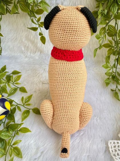 A full view of the "Simba" the pug replica doll. I used special techniques to shape his face and get his sweet, wrinkly expression just right. The collar is even personalized with his name.