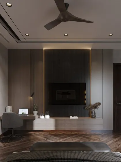 This moody bedroom concept features a dark wood floor in a herringbone pattern and a custom TV unit with an integrated desk. The backlighting adds a warm, ambient glow to the space.