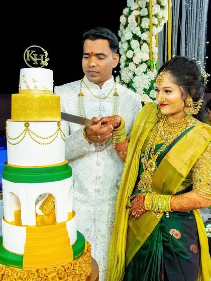A special moment as the couple cuts their magnificent five-tier engagement cake together.