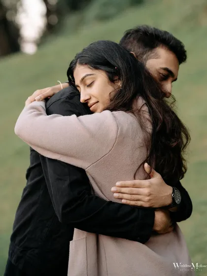 A tender embrace that feels like a safe harbor. This photo of Harshit and Aayushi focuses on the emotion of their connection, creating a powerful and intimate portrait.