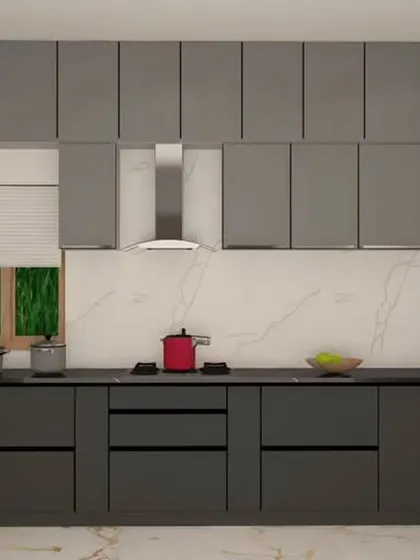 A minimalist straight kitchen design in a sophisticated matte grey finish. Handleless cabinets provide a seamless look, while the white marble-effect backsplash adds a touch of luxury and brightness to the space.