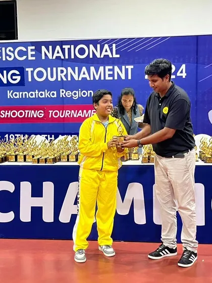 Another proud moment, awarding a young champion for his outstanding performance in the shooting tournament.