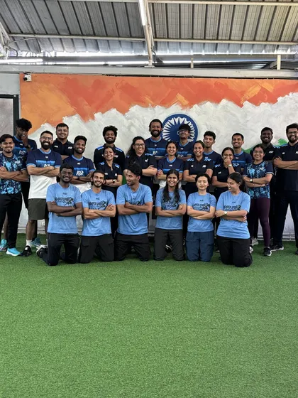 The RSF team sporting our new apparel from MS Sportswear. This group photo in front of the Indian flag captures our team unity and pride.