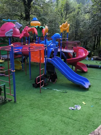 Safety and fun can go hand-in-hand. For the Nainital Eco Cave Garden, I installed durable and soft artificial grass to create a safe, all-weather play surface for the children's park.