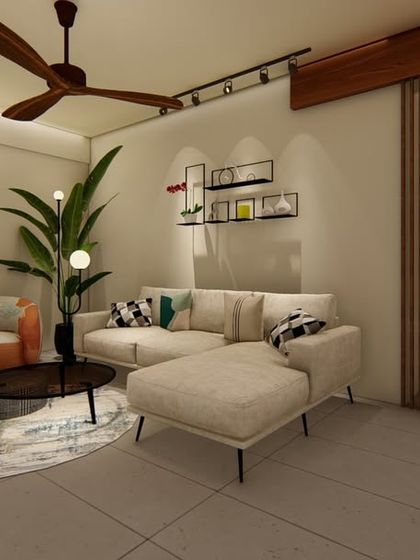 An example of our minimalist living room design, featuring a neutral-toned L-shaped sofa, a simple coffee table, and an accent armchair. The space is defined by clean lines, exposed brick, and a slatted wood partition.