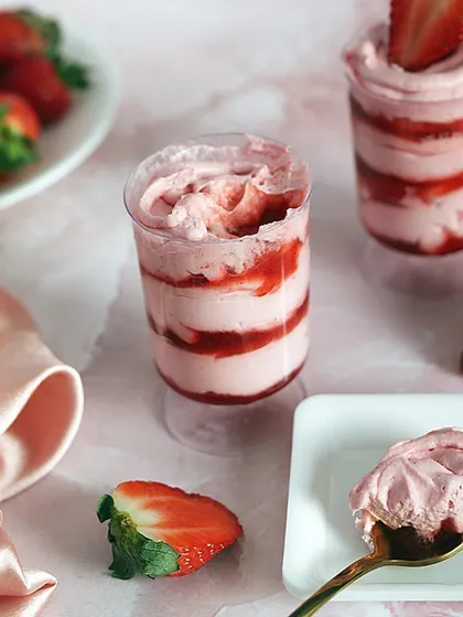 A spoonful of my strawberry mousse shows the creamy, airy texture. It’s a truly delightful experience.