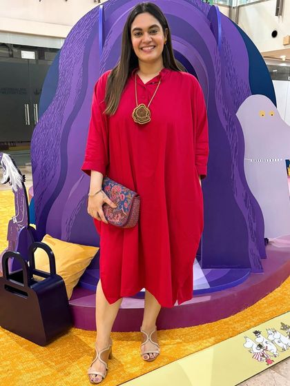 Some days are just about styling based on vibes. I paired this comfortable red shirt dress from From Out East with a bold statement necklace from Forest of Chintz for a look that's effortlessly cool.