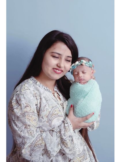 The pure joy and love on a mother's face as she looks at her new baby. My goal is to capture the authentic emotions of this special time.