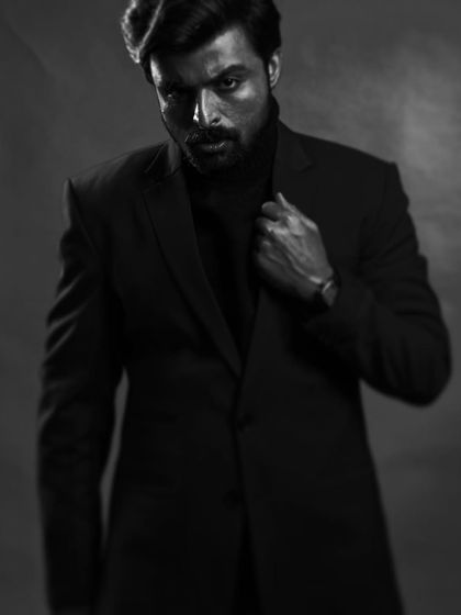 A different look for me. This photoshoot was a chance to explore a more intense, dramatic persona. It's fun to step into a different character, even for a photo.