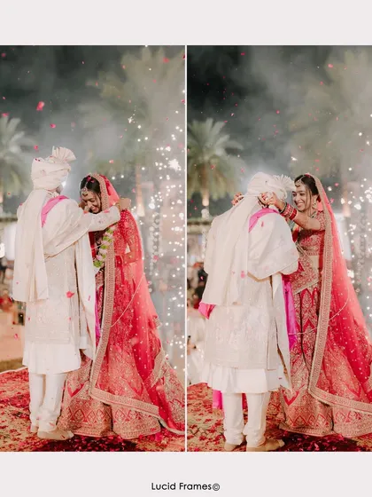 The Varmala ceremony captured with fireworks in the background, a truly explosive and magical moment.