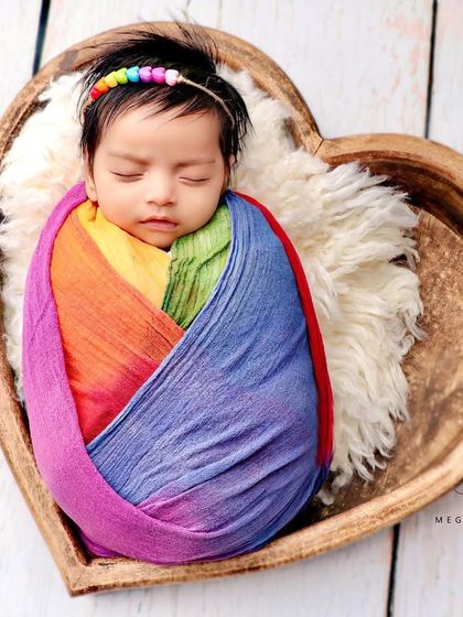 A top-down view of the rainbow baby in the heart bowl, a symbol of hope and joy.
