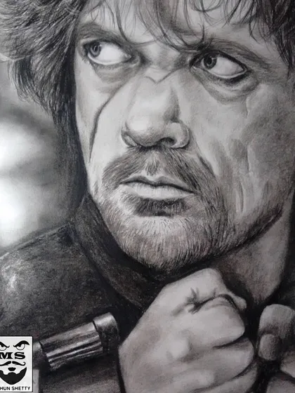 A charcoal sketch of Tyrion Lannister from Game of Thrones. This piece showcases my skill in capturing dramatic expressions and creating depth with classic black and white charcoal, perfect for fans of pop culture.