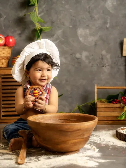 Welcome to my studio, where we cook up the cutest memories. This little chef was an absolute star during his creative themed photoshoot, showing off his delightful personality.
