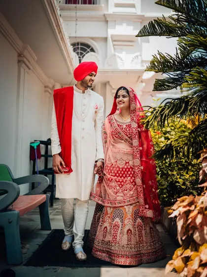 We have extensive experience capturing the unique beauty of diverse cultural weddings. This portrait of a Sikh couple showcases their stunning traditional attire and the serene happiness of their wedding day.