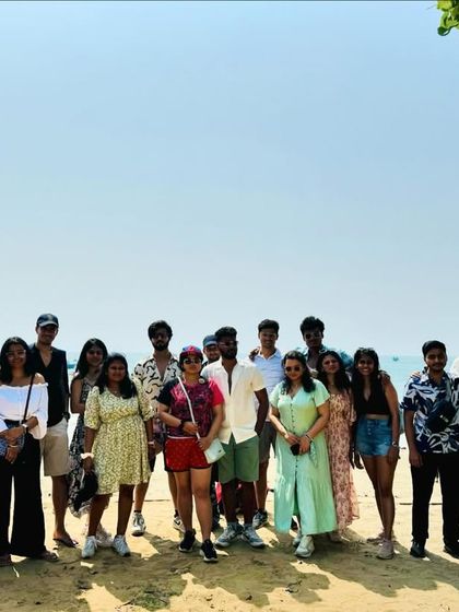 A happy group photo on the beach during our Gokarna and Dandeli adventure trip.