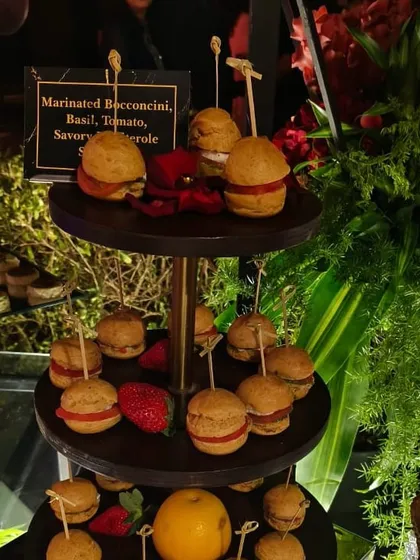 Bite-sized savory profiteroles filled with marinated bocconcini, basil, and tomato. These are a perfect pass-around appetizer for a sophisticated cocktail hour or high-tea.