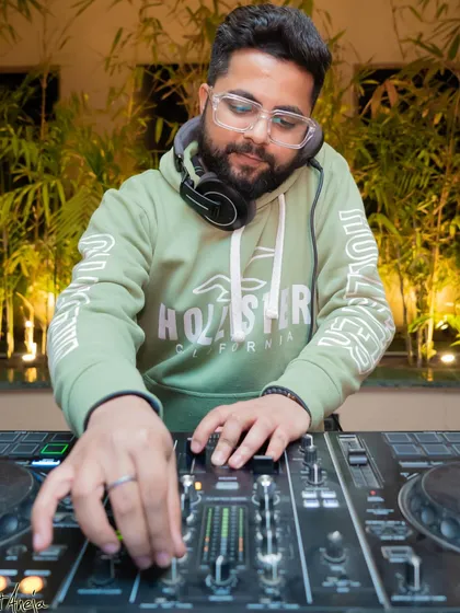 Another angle of me working the mixer, ensuring a seamless flow of music all night long.