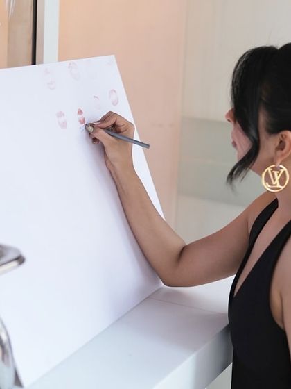 Another personal touch: a 'Pucker Up' board for guests to leave a lipstick kiss and a message.