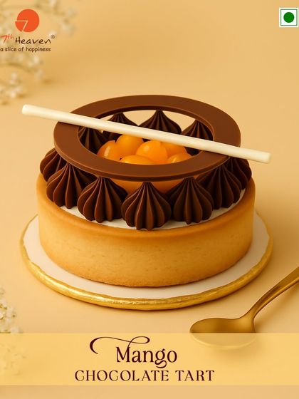 A tart that talks tropical. Our Mango Chocolate Tart features a buttery crust, a rich chocolate layer, and is topped with fresh mango and a decorative chocolate ring.