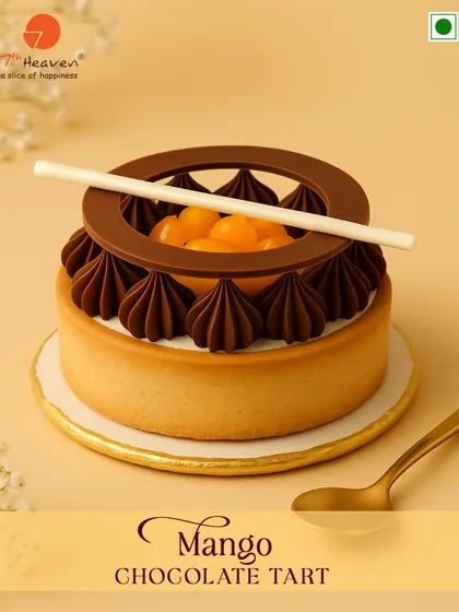 A tart that talks tropical. Our Mango Chocolate Tart features a buttery crust, a rich chocolate layer, and is topped with fresh mango and a decorative chocolate ring.