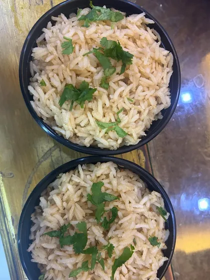 A bowl of healthy and nutritious brown rice. I offer this as an alternative to white rice for my health-conscious customers.