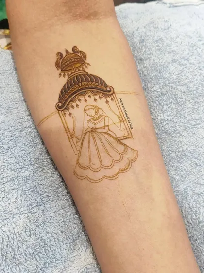 The initial outline of a bride in a doli, or palanquin, a classic and symbolic element in bridal mehndi.