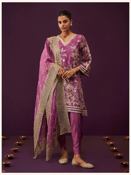 Here is the Sunee Organza Grape Kurta Set again because it's just that good. The detailed embroidery on the organza fabric makes it a truly special piece for your collection.