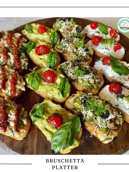 My Bruschetta Platter is a splash of Italian sunshine. I use toasted artisanal bread with a variety of fresh toppings like creamy avocado with basil, rich sun-dried tomatoes, and classic olive tapenade, making it a perfect appetizer for any get-together.