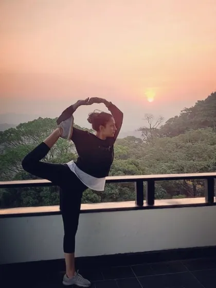 Here I am in Natarajasana, or King Dancer Pose, against a beautiful sunset. This challenging balance pose is more than a physical feat. It embodies the dance of Shiva and teaches us to find stability and grace even when life feels unsteady. It's a practice of releasing fear and embracing change.