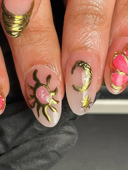 A super detailed close-up of this celestial-themed set. I used gold chrome to create a sun, moon, and butterfly, all on a sheer pink base. The texture is amazing.