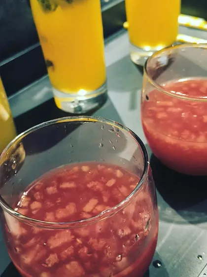 A close-up of our fresh fruit mocktails. We use real fruit pieces in our drinks to provide an authentic and refreshing taste experience for your guests.