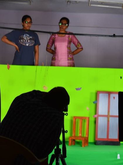 Behind the scenes of a new project, using a green screen to create special visual effects for our puppet show.