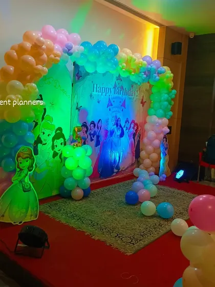 A closer look at the character cutouts and balloon arrangements for the princess party.